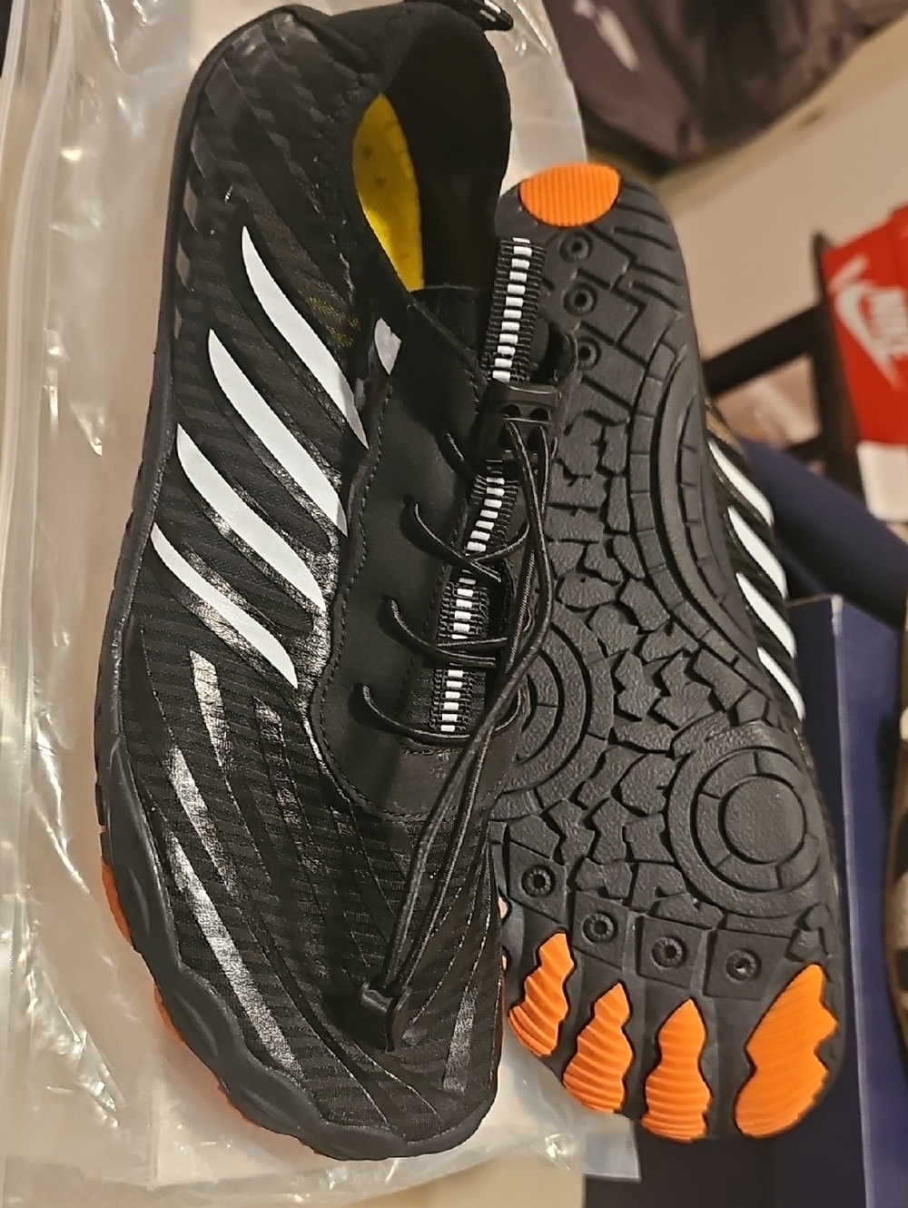 Men's Black Athletic Toe-Style Shoes with Orange Accents